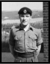 A young Carlton Brown poses in Battle Dress.