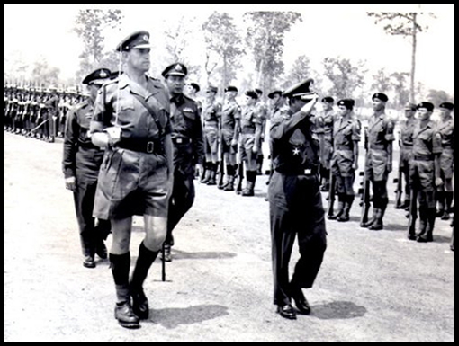 Capt Terry Hardy escorts The Prime Minister of Thailand as he inspects the Honour Guard.