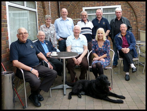 The Black Lab's name is Archie and if he had a surname, it would be Mitchell.