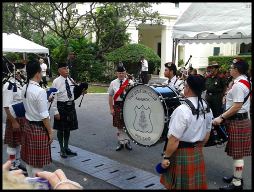The Bangkok Drum and Pipe Band prepare to play in the British Embassy.