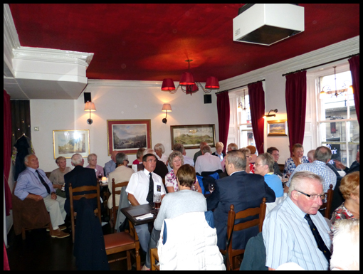 A picture of the group in the dining room.