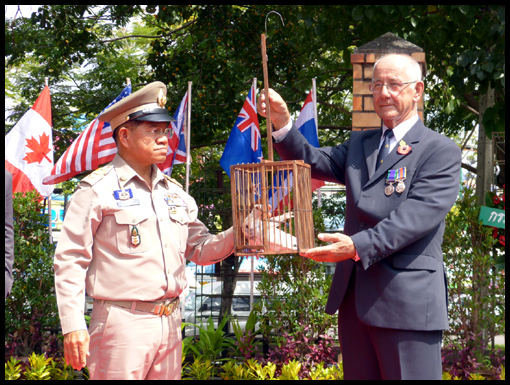 The Gonernor of Ubon and Jim Curtis release a 'Dove of Peace.