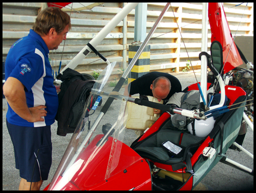 Tony re-fuels his Kwik under the watchful eye of Tom.