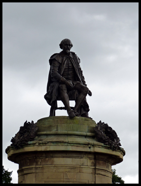 William Shakespeareb sits on his plinth looking down on his town ofd Stratford.