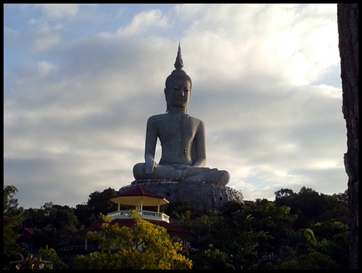 The Gigantic Manorom Buddha statue and a view of Mukdahan.