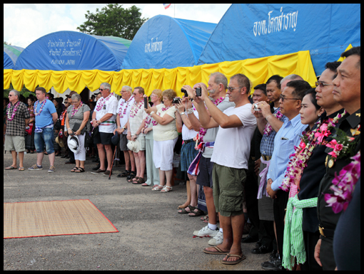 The gathering stand quietly for the lament and two minutes silence.
