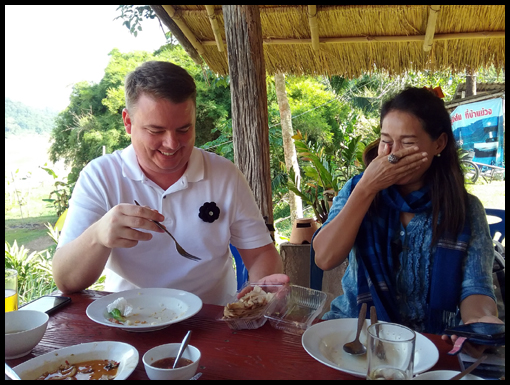 Relaxing at lunch by a peaceful Mekong.
