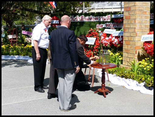 The Governor lights the Lantern of Peace.