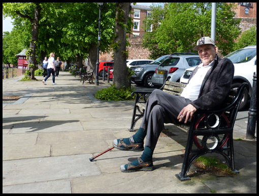 Alan Myers relaxing beside the river at Chester.