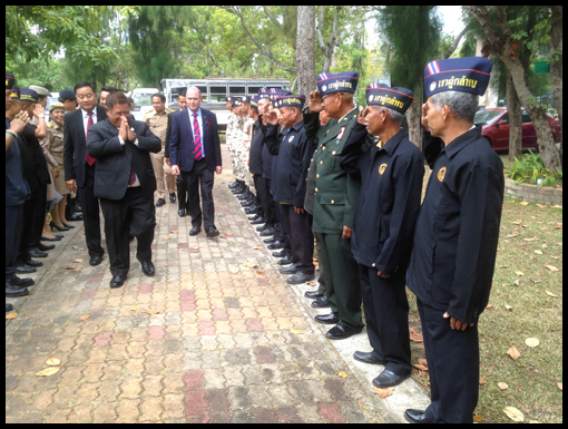 The Governor of Ubon walks through an honour guard of Veterans.