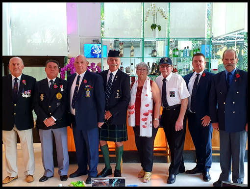 The Remembrance Service group depart from the Silq for the Embassy Social Club.
