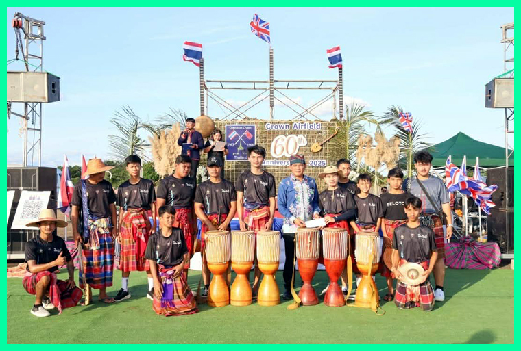 The Drum band pose for the camera.