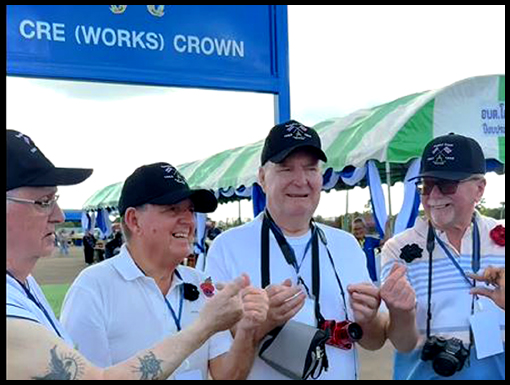 Ray Hough receives advice on how to form a small heart