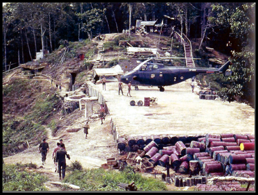 A helicopter landing pad built in the mountainous jungle of Borneo.