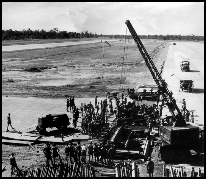 A picture taken from the Airfield Control Tower of the last batch of concrete being laid.