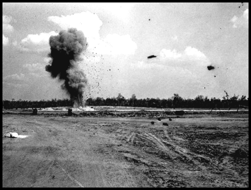 Rocks come raining down towards the cameraman after the explosion.