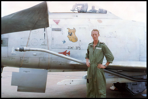 Bob 'Pin' Richardson stands beside his Sabre Fighter Aeroplane