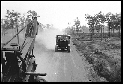 A REME Recovery Scammel travels in convoy 